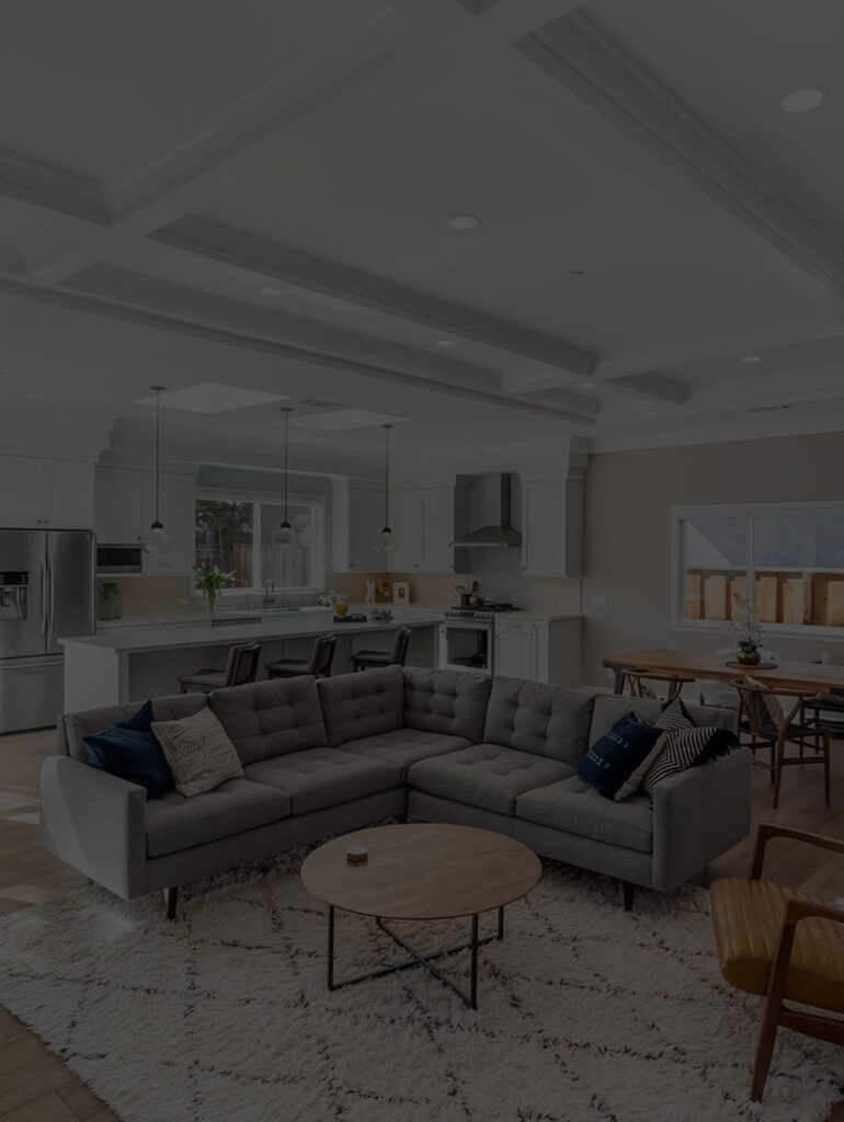 Living room showing a large gray sectional couch