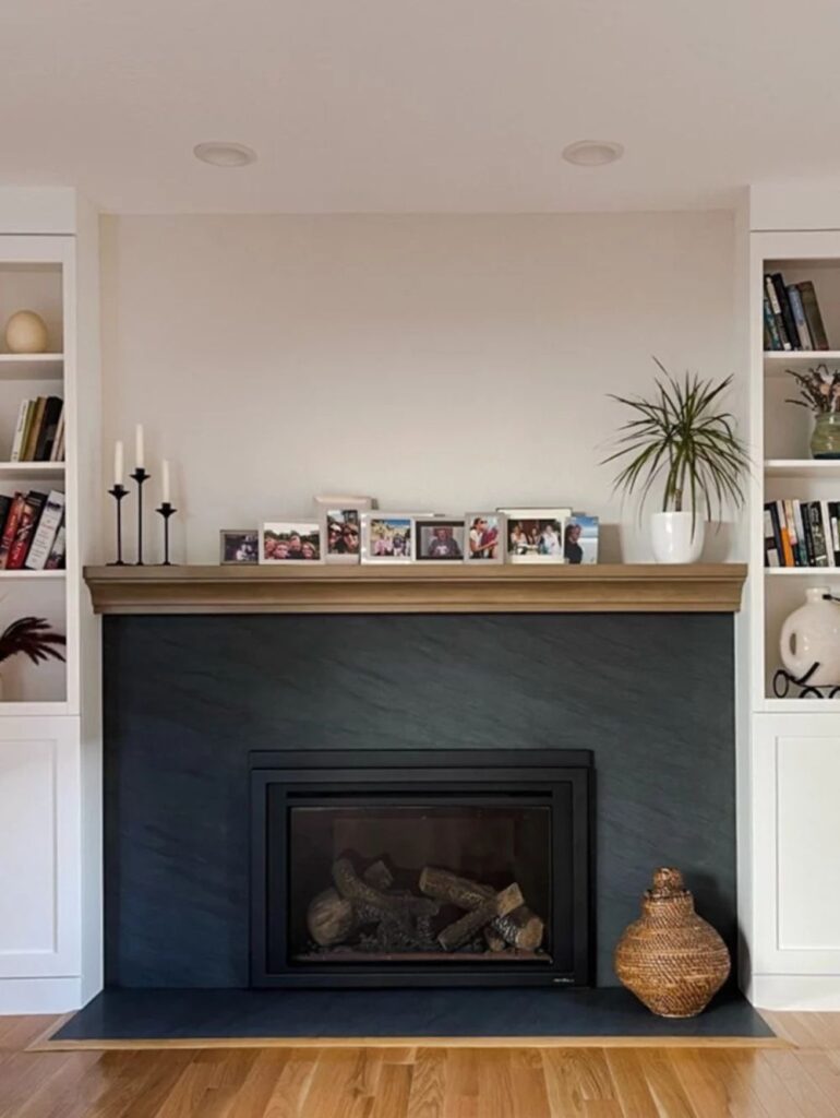 Fireplace surrounded by built-in storage