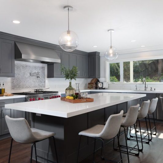 Los Gatos Kitchen Remodeled After with gray cabinets and large island